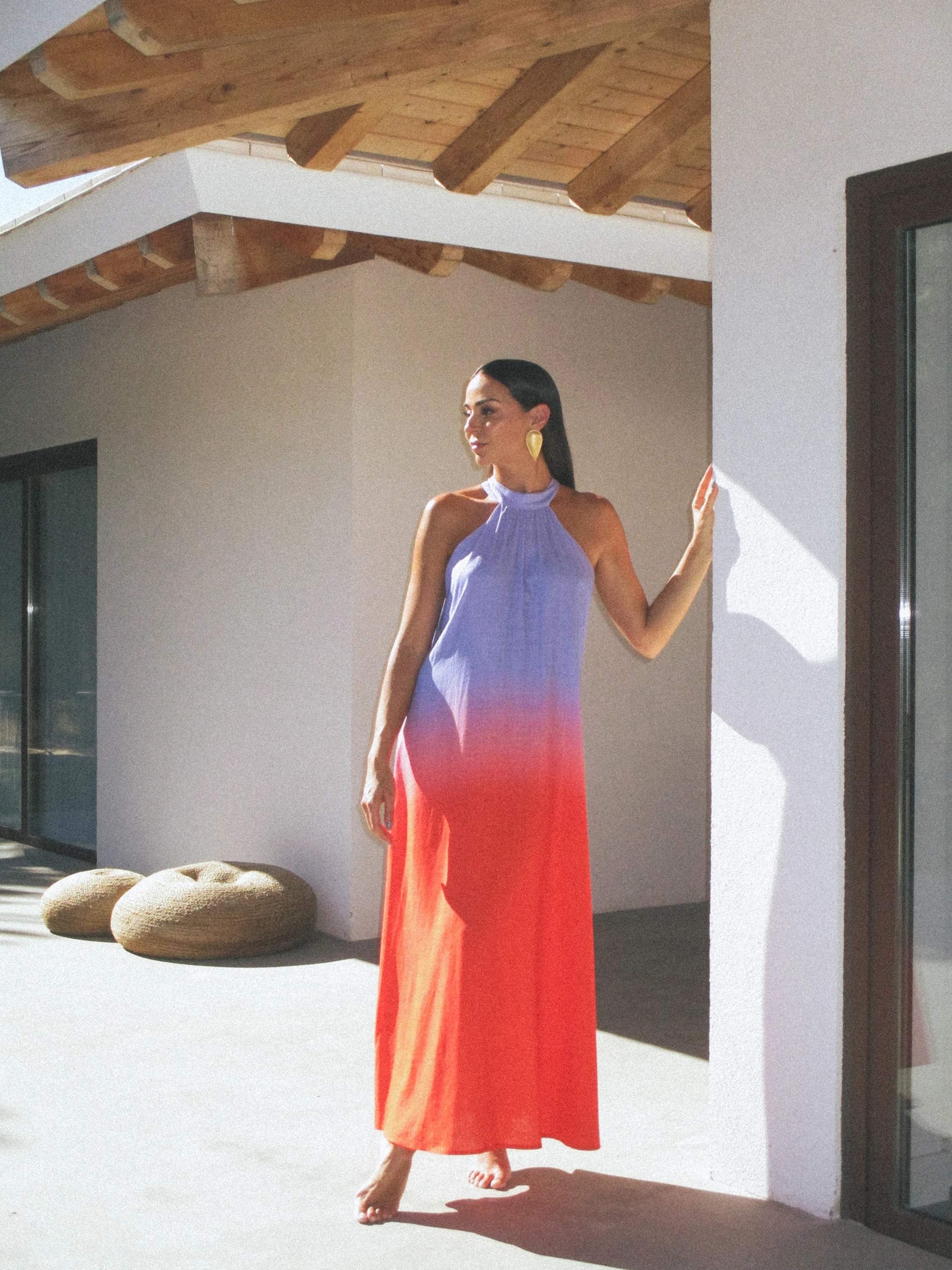Sienna and Vanessa Martins join forces in a breathtaking collaboration, weaving together a tale of sophistication through a captivating capsule collection of long gradient dresses.
