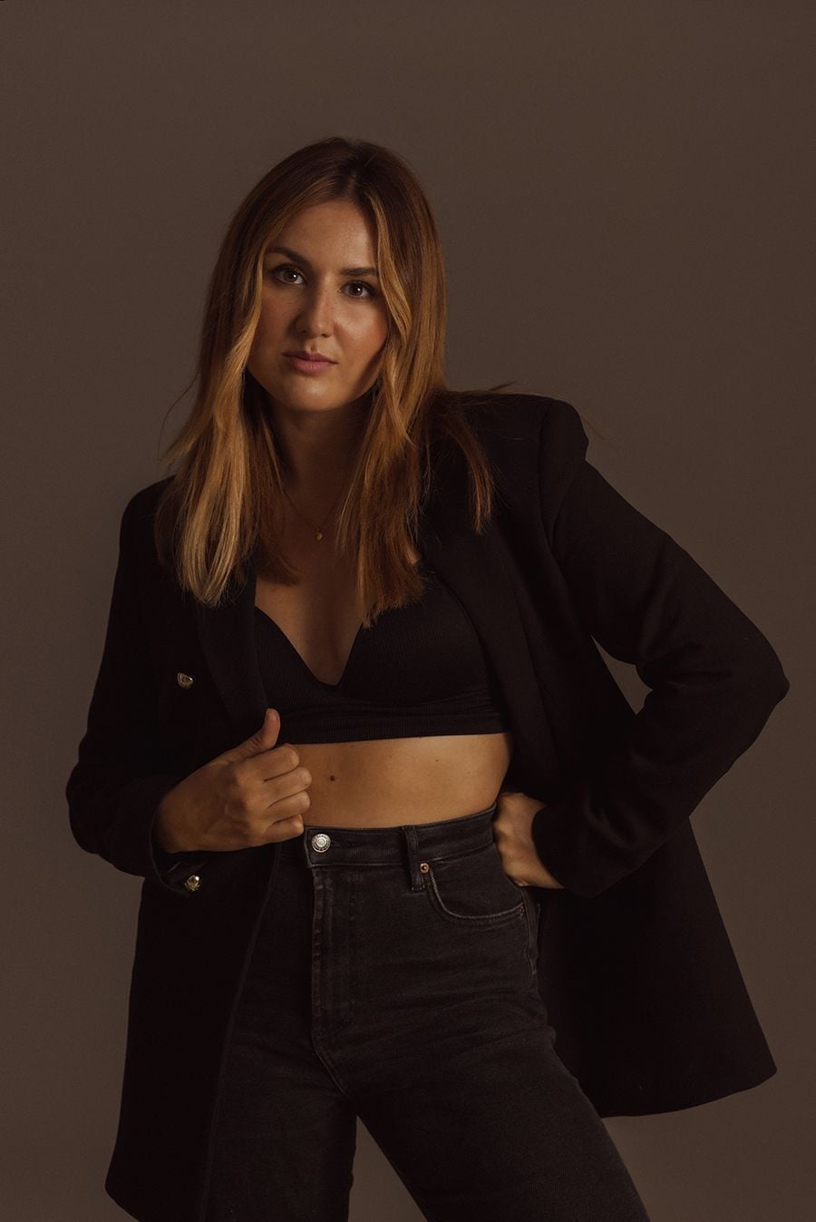 KAT V holding a professional camera