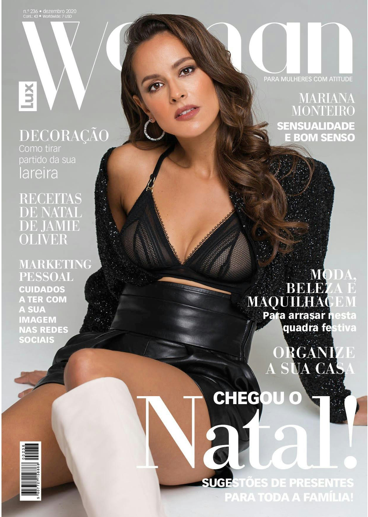 A woman sits on a couch wearing leather boots and black lingerie. She is on the cover of Woman magazine, which shows she is featured as
the model